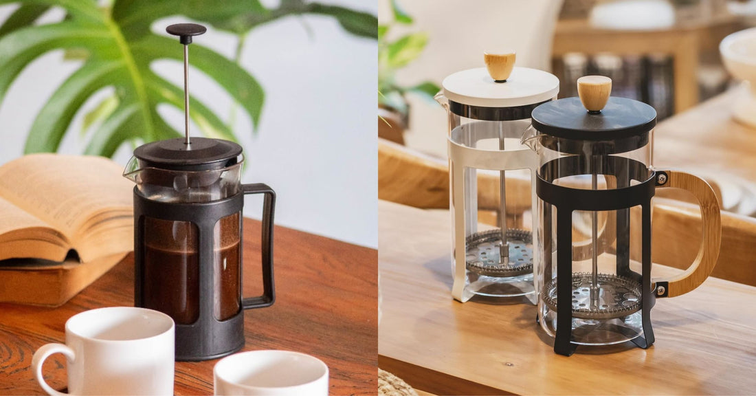 Three French press coffee makers on wooden tables, with white coffee cups and an open book nearby.